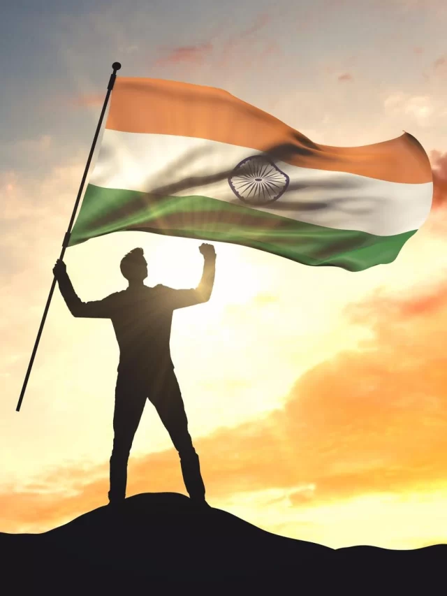 india-flag-being-waved-by-man-celebrating-success-top-mountain-3d-rendering