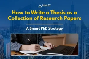 A person writing a thesis on a laptop with research papers